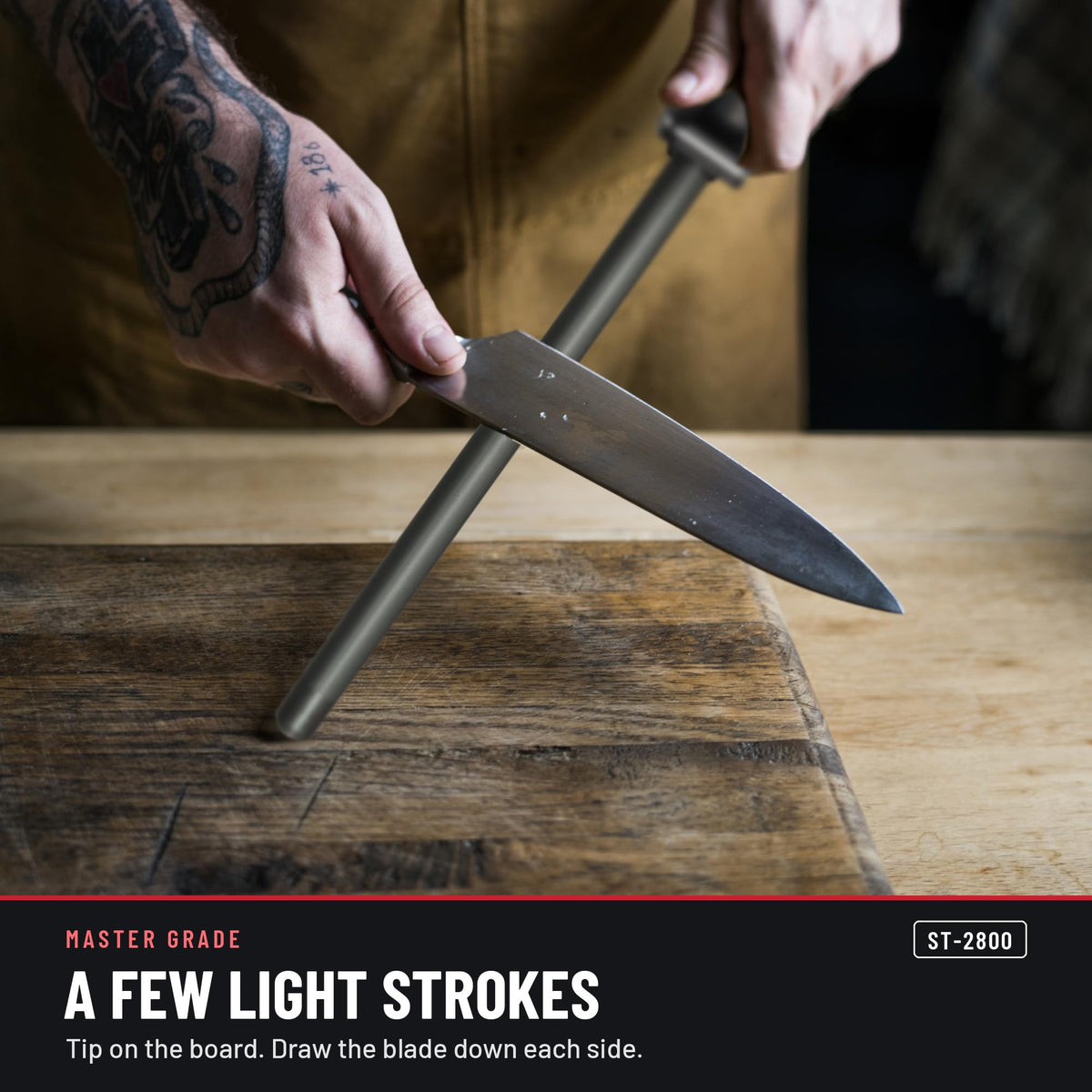 Master Grade ST-2800 11 in black ceramic honing rod with 2 stripes, honing a knife with a few light strokes