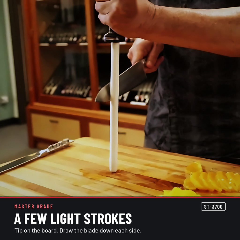 Master Grade ST-3700 11 in white ceramic honing rod, honing a knife with a few light strokes